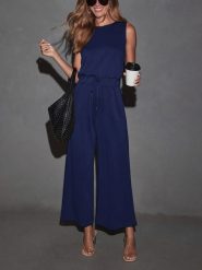 Milan Kiss Kombinezon w kolorze granatowym rozmiar: M. Niebieskie kombinezony damskie Milan Kiss, m, bez wzorów, z wiskozy, bez kołnierzyka, bez ramiączek. Za 173.99 zł.