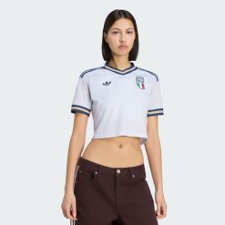 Koszulka wyjazdowa o skróconym fasonie Włochy 26. Niebieskie bluzki sportowe damskie Adidas, xs, z materiału, bez kołnierzyka, bez ramiączek. Za 369.00 zł.