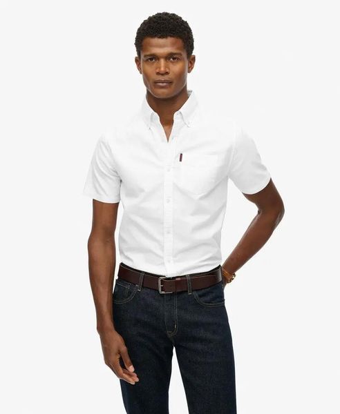 Superdry Koszula Oxford krótkiego rękawa z bawełny organicznej. Białe koszule damskie Superdry., m, bez wzorów, z bawełny, bez kołnierzyka, bez ramiączek. Za 279.65 zł.