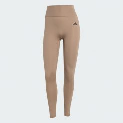 Legginsy Optimé Essentials No Front Rise Seam 7/8. Brązowe legginsy damskie Adidas, s, bez wzorów, z elastanu. Za 219.00 zł.