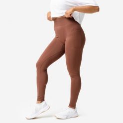 Legginsy fitness damskie Domyos Push Up. Brązowe legginsy damskie DOMYOS, l, bez wzorów, z elastanu, na fitness i siłownię. Za 129.99 zł.
