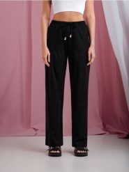 Spodnie wide leg - czarny. Czarne spodnie materiałowe damskie Sinsay, bez wzorów, z dzianiny. Za 49.99 zł.