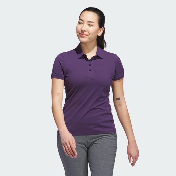 Koszulka Ultimate365 Tour Twistknit Polo. Fioletowe bluzki damskie Adidas, s, bez wzorów, z materiału, sportowe, bez kołnierzyka, bez ramiączek. Za 329.00 zł.