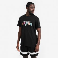 Koszulka do koszykówki unisex Tarmak NBA TS 900 San Antonio Spurs. Czarne bluzki damskie TARMAK, xs, bez wzorów, z bawełny, sportowe, bez kołnierzyka, bez ramiączek. Za 79.99 zł.