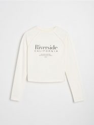 Koszulka z długimi rękawami - kremowy. Białe t-shirty damskie Sinsay, l, bez wzorów, bez kołnierzyka. W wyprzedaży za 13.99 zł.