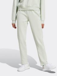 Adidas Spodnie dresowe w kolorze jasnozielonym rozmiar: S. Zielone spodnie dresowe damskie Adidas, s, bez wzorów, z dresówki. Za 131.74 zł.