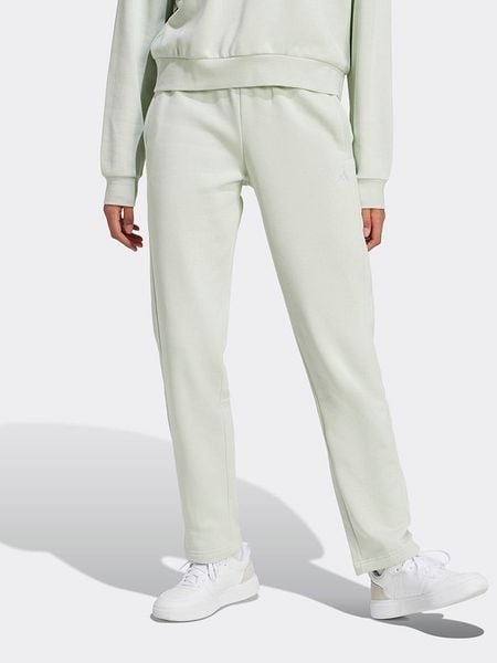 Adidas Spodnie dresowe w kolorze jasnozielonym rozmiar: S. Zielone spodnie dresowe damskie Adidas, s, bez wzorów, z dresówki. Za 148.96 zł.