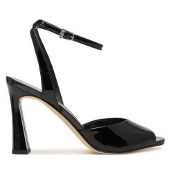 Sandały MICHAEL Michael Kors. Czarne sandały damskie MICHAEL Michael Kors, bez wzorów, bez obcasa, na słupku. Za 699.99 zł.