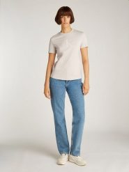 CALVIN KLEIN JEANS Koszulka w kolorze kremowym rozmiar: XS. Brązowe bluzki damskie Calvin Klein Jeans, xs, bez wzorów, z bawełny, bez kołnierzyka, bez ramiączek. Za 100.99 zł.