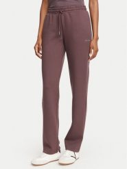 Guess Spodnie dresowe V6YB25 K4803 Brązowy Regular Fit. Brązowe spodnie dresowe damskie Guess, xl, z aplikacjami, z dresówki. Za 344.99 zł.