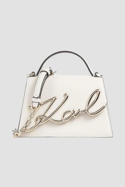 KARL LAGERFELD Biała mała skórzana torebka K/Signature 2.0. Białe torebki klasyczne damskie Karl Lagerfeld, bez wzorów, ze skóry, eleganckie, bez kołnierzyka, bez ramiączek. W wyprzedaży za 1,069.99 zł.