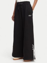 Reebok Spodnie dresowe Dominka RK25696CCW Czarny Regular Fit. Czarne spodnie dresowe damskie Reebok, s, bez wzorów, z bawełny. Za 279.99 zł.