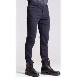 Granatowe jeansy męskie Regular fit - Granatowy. Niebieskie jeansy męskie TRUSSARDI JEANS. Za 200.00 zł.