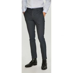 Jack & Jones - Spodnie. Niebieskie spodnie materiałowe męskie Jack & Jones, z elastanu. W wyprzedaży za 139.90 zł.