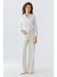 Oui Dżinsy - Comfort fit - w kolorze kremowym rozmiar: 42. Brązowe jeansy damskie Oui, z podwyższonym stanem. Za 339.99 zł.