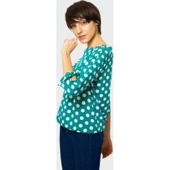 Elegancka bluzka z nadrukiem. Bluzki damskie Greenpoint, bez wzorów, z wiskozy, eleganckie, bez kołnierzyka, bez ramiączek. Za 29.99 zł.
