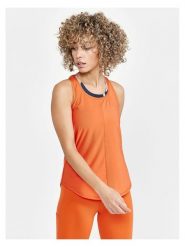 Craft Top sportowy "Core Charge" w kolorze pomarańczowym rozmiar: XS. Pomarańczowe topy damskie Craft, xs, bez wzorów, z materiału, bez kołnierzyka. Za 43.99 zł.