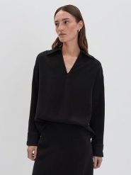 Someday Bluzka w kolorze czarnym rozmiar: 40. Czarne bluzki damskie Someday, bez wzorów, bez kołnierzyka, bez ramiączek. Za 165.99 zł.