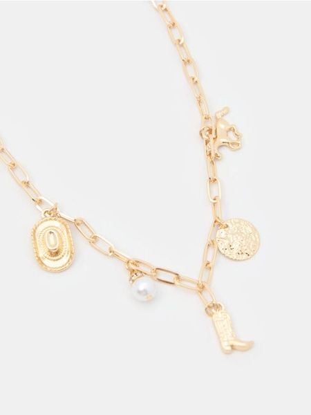 Naszyjnik z zawieszką - złoty. Żółte naszyjniki damskie Sinsay, złote. Za 9.99 zł.