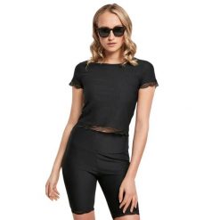Koszulka court dentellé damska Koszulka Urban Classics. Czarne bluzki sportowe damskie Urban Classics, bez wzorów, z koronki, bez ramiączek. Za 188.50 zł.