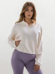 Bluza z domieszką wiskozy - kremowy. Białe bluzy bez kaptura damskie Sinsay, l, bez wzorów, z wiskozy, bez ramiączek, bez kaptura. Za 49.99 zł.