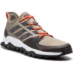 Buty adidas - Kanadia Trail F35423 Tracar/Gresix/Cblack. Zielone buty sportowe na co dzień męskie Adidas, z materiału, bez zapięcia, do biegania. W wyprzedaży za 199.00 zł.
