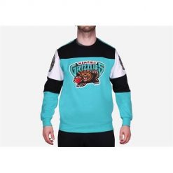 Bluza sportowa męska Mitchell & Ness Memphis Grizzlies. Niebieskie bluzy bez kaptura męskie Mitchell & Ness, bez wzorów, sportowe, bez kołnierzyka, bez ramiączek. Za 525.00 zł.