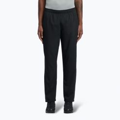 Spodnie treningowe męskie Reebok ID Train Woven. Czarne spodnie materiałowe męskie Reebok, bez wzorów. W wyprzedaży za 176.30 zł.