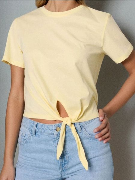Koszulka wiązana w talii - yellow jeans. Żółte t-shirty damskie Sinsay, l, bez wzorów, z jeansu, bez kołnierzyka. W wyprzedaży za 13.99 zł.