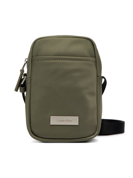 Calvin Klein Saszetka Sleek Slim Reporter LV04D3233G Zielony. Zielone saszetki męskie CALVIN KLEIN, z materiału. Za 289.99 zł.