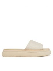 Calvin Klein Klapki Flatform Slide Jacq HW0HW02461 Écru. Klapki damskie CALVIN KLEIN, bez wzorów, z materiału, bez obcasa. Za 389.99 zł.