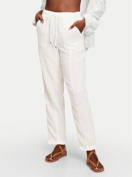 Gap Spodnie materiałowe 866663-02 Écru Regular Fit. Spodnie materiałowe damskie GAP, bez wzorów, z bawełny. Za 189.99 zł.