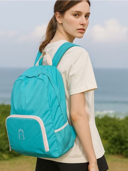 Lekki składany plecak w małą torebkę - turkusowy. Niebieskie plecaki damskie Sinsay, bez wzorów, sportowe. Za 19.99 zł.