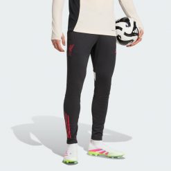 Spodnie treningowe Liverpool FC Tiro 25 Competition. Czarne spodnie materiałowe męskie Adidas, z aplikacjami, z materiału. Za 309.99 zł.