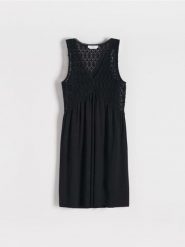 Sukienka mini z koronką - czarny. Czarne sukienki damskie Reserved, l, bez wzorów, z koronki, bez kołnierzyka, bez ramiączek, mini. W wyprzedaży za 39.99 zł.