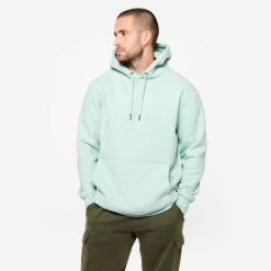 Bluza z kapturem męska Domyos Gym & Pilates. Czarne bluzy sportowe męskie DOMYOS, bez wzorów, z bawełny, sportowe, bez kołnierzyka, bez ramiączek. Za 129.99 zł.