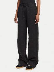 Guess Spodnie dresowe V6YB10 K4295 Czarny Regular Fit. Czarne spodnie dresowe damskie Guess, m, z aplikacjami, z dresówki. Za 344.99 zł.