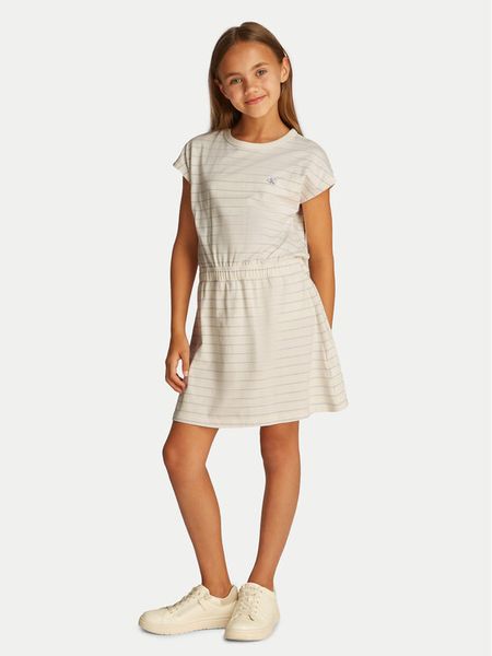 Calvin Klein Jeans Sukienka codzienna IG0IG02929 Beżowy Regular Fit. Brązowe spodnie dziewczęce Calvin Klein Jeans, bez wzorów, z bawełny, bez ramiączek. Za 159.99 zł.