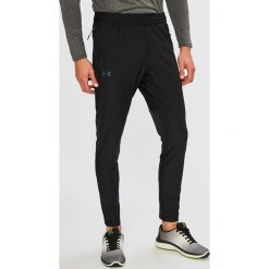 Under Armour - Spodnie Threadborne Vanish. Czarne spodnie sportowe męskie Under Armour, z dzianiny. W wyprzedaży za 129.90 zł.