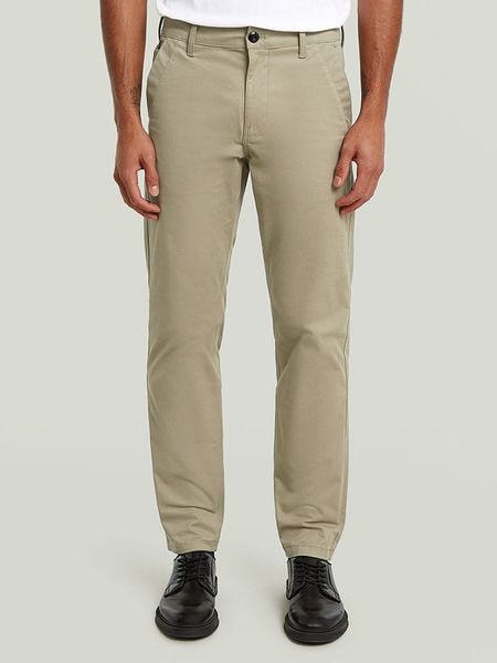 G-Star Spodnie chino w kolorze beżowym rozmiar: W34/L32. Brązowe spodnie materiałowe męskie G-Star, bez wzorów, retro. Za 188.85 zł.
