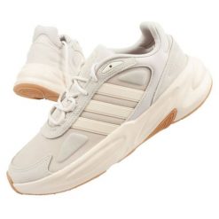 Buty adidas Ozelle GX6762 beżowy. Brązowe buty sportowe na co dzień męskie z materiału, bez zapięcia. Za 414.66 zł.