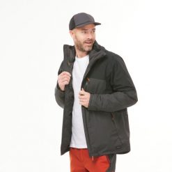 Kurtka turystyczna męska zimowa Quechua MH500 mountain -10°C wodoodporna. Czarne kurtki męskie FORCLAZ, na zimę, l, bez wzorów, z tkaniny, sportowe, bez kaptura. Za 499.99 zł.