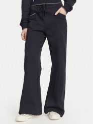Guess Spodnie dresowe W6YB31 K5319 Granatowy Wide Leg. Niebieskie spodnie dresowe damskie Guess, xs, z aplikacjami, z dresówki. Za 434.99 zł.