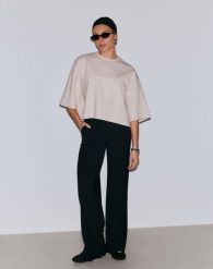 Damskie spodnie z mieszanki modalu, wysoki stan, szerokie nogawki Luxe czarne. Czarne spodnie sportowe damskie Aim'n, s, z elastanu, na fitness i siłownię. Za 508.00 zł.
