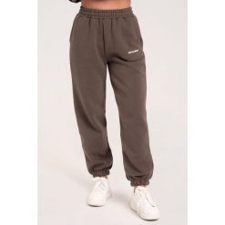 Spodnie fitness damskie Gym Glamour dresowe. Brązowe spodnie dresowe damskie GYM GLAMOUR, l, z dresówki, na fitness i siłownię. Za 189.99 zł.