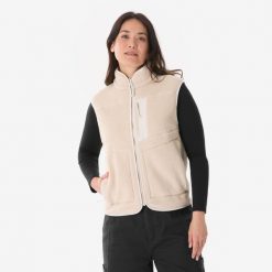 Kamizelka turystyczna polarowa damska Quechua MH500. Brązowe kamizelki damskie QUECHUA, m, z materiału. Za 129.99 zł.