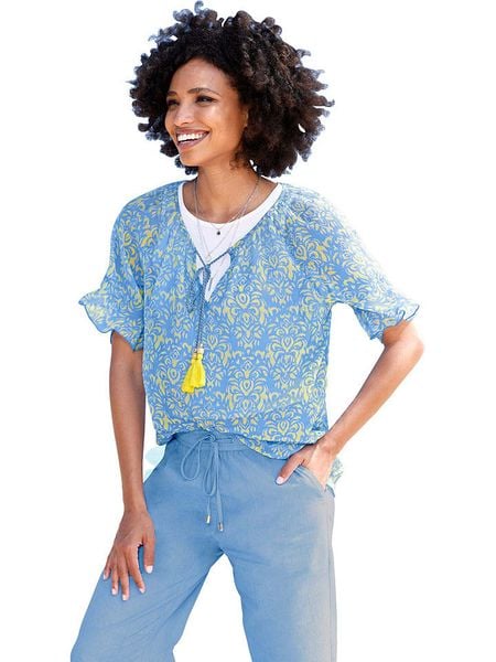 Heine Bluzka w kolorze błękitnym rozmiar: 36. Niebieskie bluzki damskie Heine, bez wzorów, bez kołnierzyka, bez ramiączek. Za 48.16 zł.