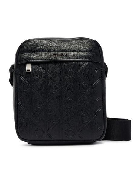Calvin Klein Saszetka Emblem Aop Deboss Reporter LV04D3562G Czarny. Czarne saszetki męskie CALVIN KLEIN, ze skóry. Za 369.99 zł.