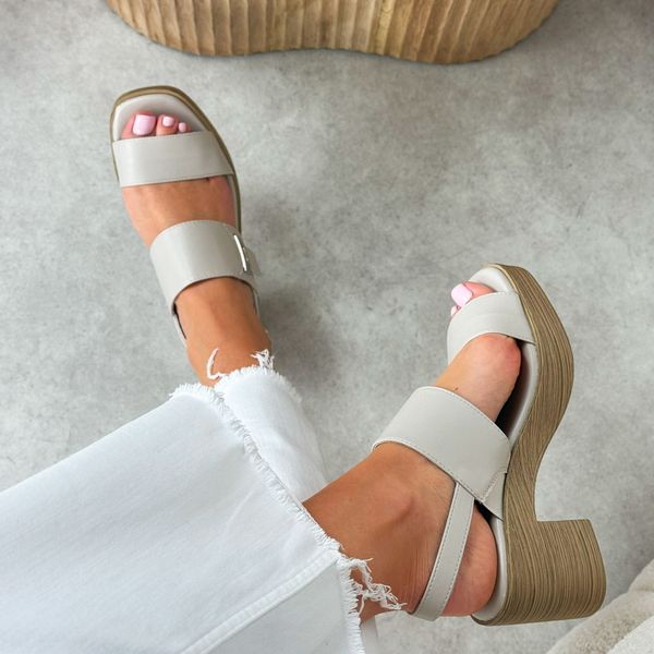 Białe sandały damskie na obcasie M.Daszyński 23126-9. Białe sandały damskie M.Daszyński, bez wzorów, ze skóry, bez obcasa, na obcasie. Za 159.00 zł.