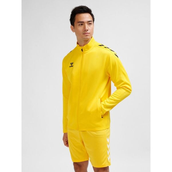 Bluza dresowa zapinana na zamek błyskawiczny Hummel Core XK. Brązowe bluzy sportowe damskie HUMMEL, bez wzorów, z dresówki, bez ramiączek, bez kaptura. Za 202.00 zł.